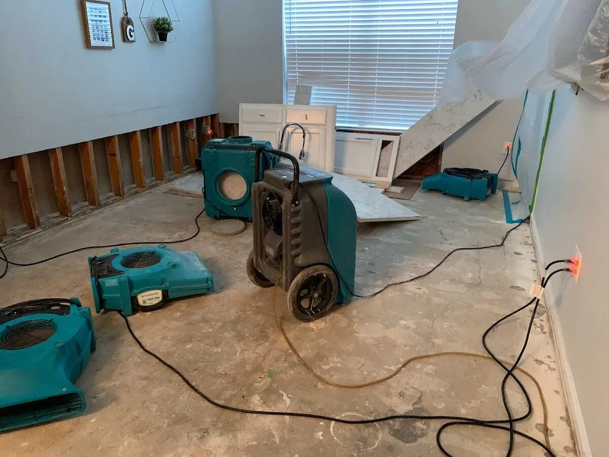 Dehumidifier in flood-cut room for Water Damage Restoration in Rostraver